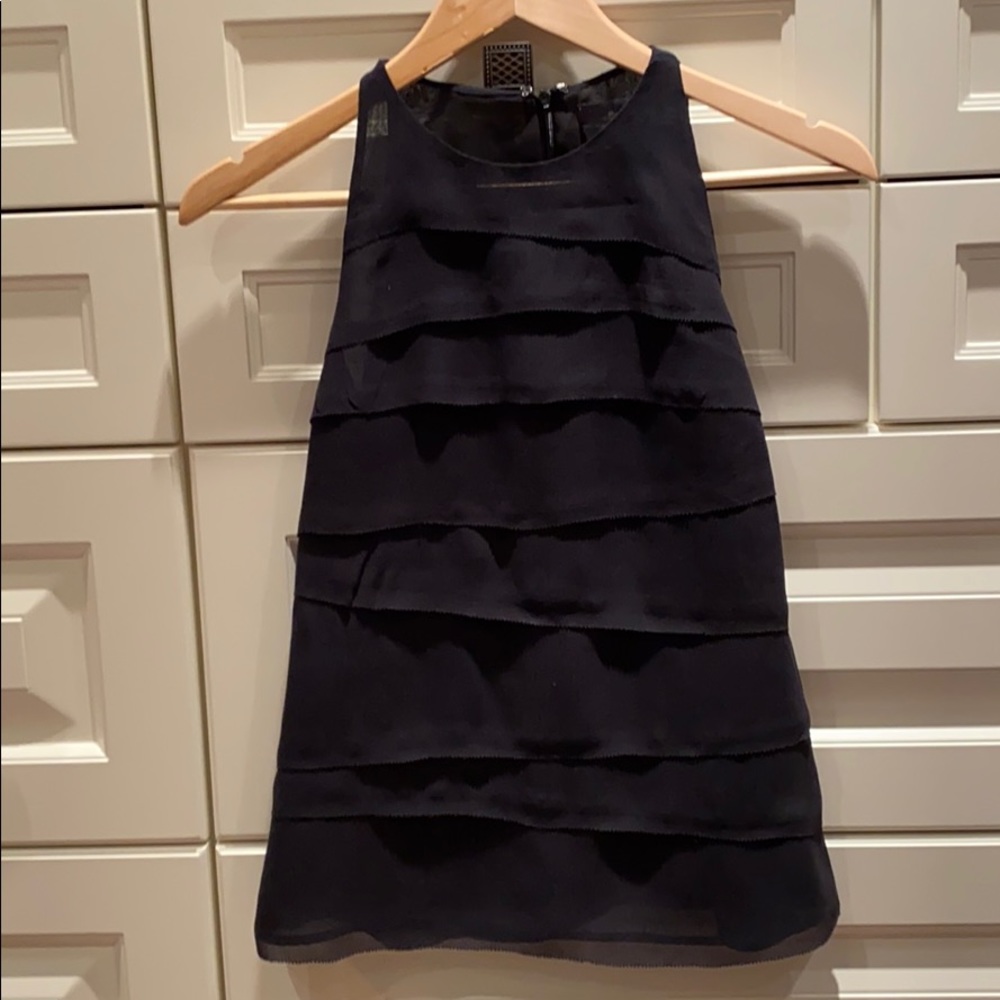 Fashionable black silk top.